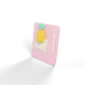 A clay magnet on a fridge door